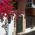 Lefkada Town Traditional House / Cozy Yard