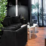 Novel, Acropolis Apartment