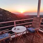 Enjoy A Wondeful Sunset From A Traditional House-Aggelos
