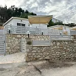 Rouli'S Houses By All About Paxos