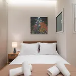 Vibrant Pagrati 2-Bd Retreat With Elegant-Modern Style